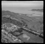 The suburb of Strathmore with Scots College and Miramar Golfcourse in foreground, with Rongotai Airport and reclamation work into Lyall Bay beyond, Wellington City