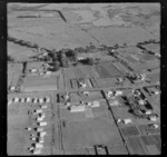 Drainage ponds and unidentified school, Mangere, Auckland