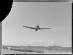 Grumman TBF Avenger aeroplane, in flight over an unidentified location