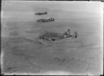 Three Lockheed Hudson aeroplanes, in flight over an unidentified location