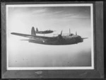 A pair of Vickers Wellington bomber aircrafts, in flight, location unidentified