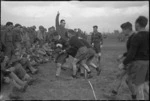 American and New Zealand spectators watch exhibition rugby match in Italy, World War II - Photograph taken by George Kaye