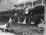 Group alongside the Pilot Station at Worser Bay, Wellington