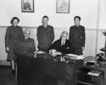NZEF in Japan - A group taken in the office of Mr Justice Northcroft at the International Military Tribunal Tokyo during the trial of the former Japanese Prime Minister, Tojo, and 26 other alleged war criminals.