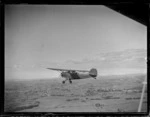 Rearwin Sportster aircraft, ZK-AIP, in flight over Auckland