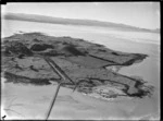 View of the Kellihers' Puketutu Island farm with causeway access road, Manukau Harbour, South Auckland