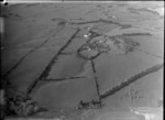 Glendowie, Auckland City, aerial view of Kerridge family home with tennis courts and ornamental gardens, West Tamaki Road