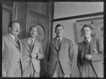 Glover family portrait, Whites Aviation office, Dilworth building, Auckland, (L to R) Captain H L M Glover BOAC (British Overseas Airways Corporation), B G Glover ex 25, 78, 102 squadrons, Denis Glover ex Navy Christchurch and D Donovan
