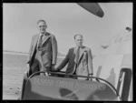 Sir John Buchanan and Mr W Hambrook, boarding a Tasman Empire Airways Limited aircraft