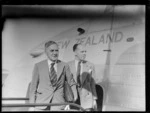 Sir John Buchanan and Mr W Hambrook, leaving a flying boat, Mechanics Bay, Auckland