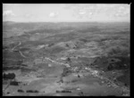 The settlement of Hikurangi surrounded by farmland, with George Street in foreground looking north, Northland Region