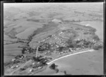 Cockle Bay, Howick, Auckland, including houses and beach