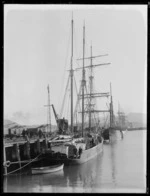 Sailing ships berthed at a Lyttelton wharf