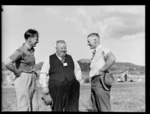 Two unidentified men and JH Corbett (middle), Royal New Zealand Aero Club pageant, Hauraki