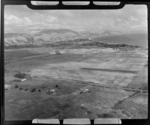 View south down the western coastline with Paraparaumu Airport and the settlements of Raumati Beach and Paekakariki beyond, Kapiti Coast, Wellington Region