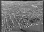 One Tree Hill Borough Council area and Campbell Road with Cornwall Park and Horotutu Road in foreground, looking to the suburb of Penrose, Auckland City