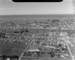 The coastal town of Wairoa with State Highway 2 Bridge over the Wairoa River, looking south to the Wairoa River mouth, Hawke's Bay Region