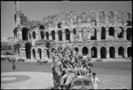 World War II New Zealand soldiers on a leave truck in Rome, Italy, in front of the Colosseum - Photograph taken by George Kaye