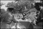 Colonel Barrington greets King George VI who visited 2 New Zealand Division during its advance to Florence, Italy, World War II - Photograph taken by George Kaye