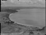 View of D Robb's residence at Stanmore Bay looking north to Orewa, North Auckland Region
