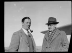 Bristol Freighter Tour, portrait of (L to R) Captain R Ellison of the Bristol Freighter 'Merchant Venturer' G-AIMC and Selwyn Vercoe (Editor of the Marlborough Express), Blenheim [Airport?], Marlborough Region