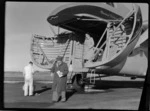 Bristol Freighter Tour, view of Sir Leonard Isitt in front of Bristol Freighter transport plane 'Merchant Venturer' G-AIMC with Mr M F Elliott (Bristol Sales Representative) standing in cargo bay, Paraparaumu Airport, North Wellington Region