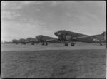 Bristol Freighter Tour, view of ex RNZAF Dakota transport planes lined up (NZ3506? in front) at Woodbourne Airport prior to being dismantled by Airwork (NZ) Ltd, Blenheim District, Marlborough Region