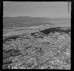 View east over the Wellington City suburbs of Newtown with Wellington Hospital in foreground to Rongotai and Wellington Airport, to Wellington Harbour Heads beyond