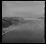 View south over the Lower Hutt Valley suburb of Eastbourne with Rona Bay and wharf, to Robinson Bay, Pencarrow and Wellington Harbour Heads, Wellington City