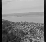 View east to the Wellington City suburb of Wadestown Hill with the Johnsonville railway line in foreground to Ngaio Gorge and Wellington Harbour with Matiu (Somes) Island beyond