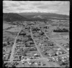 View over the town of Ohakune with Goldfinch Street in foreground and the Farmers Co-Op building to Mount Ruapehu in cloud beyond, Manawatu-Whanganui Region