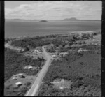 View of the settlement of Oruatua and the Tauranga Taupo River with State Highway 1 to Motutaiko Island beyond, on eastern side of Lake Taupo