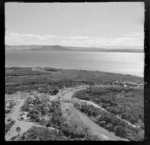 View of the settlement of Oruatua and the Tauranga Taupo River with State Highway 1 and bridge on the eastern side of Lake Taupo