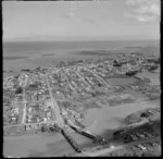 The coastal town of Patea with Patea Road-Bedford Street Bridge (State Highway 3) over the Patea River with new bridge under construction, South Taranaki Region