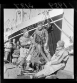 Three unidentified divers on wharf, with other three men and a ship Corinthic in the background, Wellington waterfront