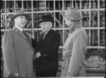 Sidney Holland (left) with Walter Nash (centre) at a building site