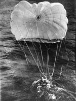 Thomas Orde-Lees in the water at New York Bay, New York City, America, after demonstrating his parachute Guardian Angel