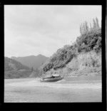 Cecil Davies, on his jet boat 'Rangimarie' on the Whanganui River