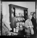 Sale of antiques in a room at Bishopscourt, a house next to Old Saint Pauls Cathedral on Mulgrave Street, with unidentified buyer, Wellington City