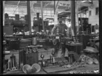Albert Percy Godber at his brass finishing lathe, Petone railway workshops