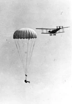 Thomas Orde-Lees parachuting, from a Handley Page aeroplane at Hendon, London, England
