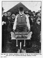 Richard Seddon wheeling a barrow of clay at the turning of the first sod of the Lawrence/Roxburgh railway works