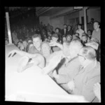 One competitor is helped off the apron during the Wallace and Newman wrestling match, Wellington Town Hall