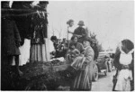 Creator Unknown :Photograph of Captain Mair with a group of Maori women, Anzac Day, Pukeroa