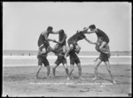 Maranui Surf Life Saving Club members cock fighting, Lyall Bay, Wellington - Photograph taken by Melba Studios