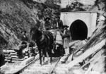 Workers by the Makohine viaduct tunnel