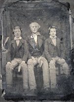 Unidentified man and two boys