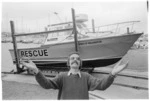 Neil Currie in front of the Wellington Sea Rescue Service boat the "Spirit of Wellington" - Photograph taken by Phil Reid