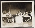 Men working at sewing machines, China
