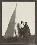 Two men by trig station on Mount Dundas, Tararua Ranges